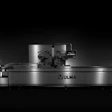 Industrial machinery line in dark monochromatic industrial setting