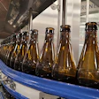 Three-line production and traceability codes are laser-marked directly onto metallized labels, with vision inspection verifying legibility at high speed.