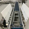 Multi-Conveyor's traffic cop assists cast divert merge.