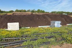 Aerated compost piles at The Compost Company are built over a network of pipes that push air through the material, helping generate and regulate the heat needed for decomposition. Sensors embedded in the piles transmit temperature data back to operators, allowing them to monitor conditions throughout the composting process.