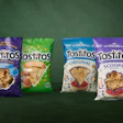 The updated packaging (right) uses a cream-colored background to create visual cohesion across the Tostitos portfolio.