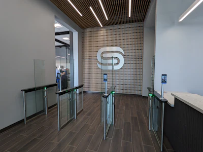 All employees and guests enter at the same doors at the front of the building. This was an intentional design element to foster interaction.