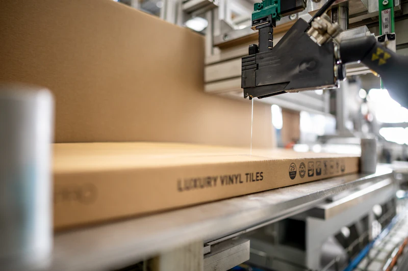 Production Pvc Sticker Flooring Manufacturer Automates Carton Sealing Without Slowing ...