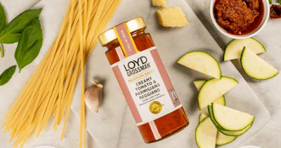 A tamper-evident vertical seal runs from the lid down to the jar body, ensuring product integrity.