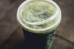 Customers are now encouraged to consume drinks directly through redesigned lids, which are recyclable and eliminate the need for an additional component.