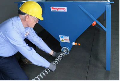 Quick-disconnect clamps near the drive point and a removable cleanout cap at the opposite end of the conveyor (shown) allow for easy removal and cleanout of the flexible screw during material changeovers.