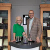 Martha Brooke, Interaction Metrics Founder, presents Dennis Fitzgerald, Yaskawa America VP of Customer Satisfaction, with the 2025 Outstanding CX Award.