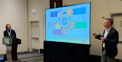 Erik Johnson of Churchill Container, left, and Christian Bruey of PureCycle Technologies discuss the stadium-to-cup recycling loop at the Packaging Recycling Summit.