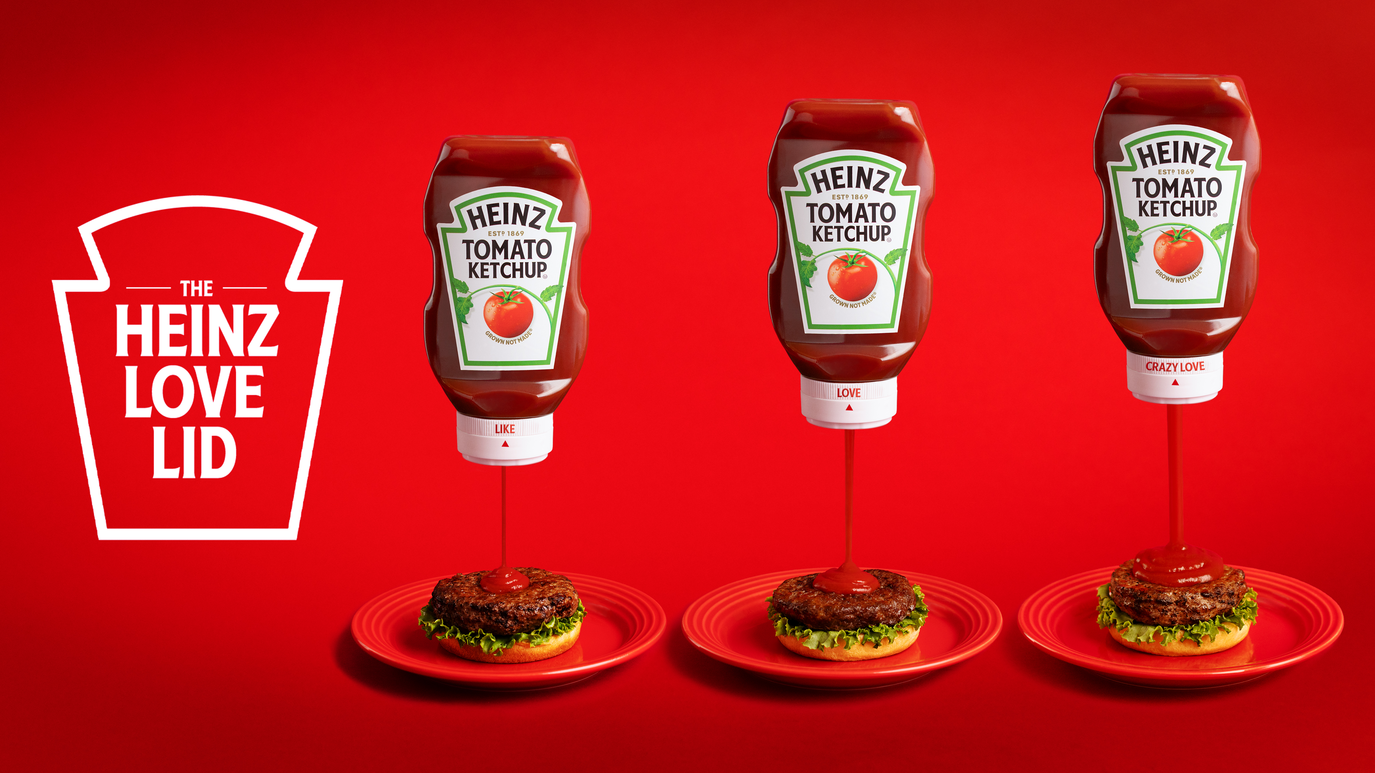 Rotating the Love Lid's dial raises an internal core away from a small inner aperture to widen flow. The two-part closure is molded from standard Heinz polypropylene, so recyclability is maintained.