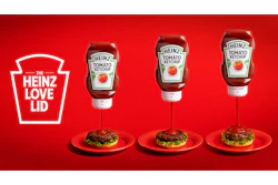 Rotating the Love Lid's dial raises an internal core away from a small inner aperture to widen flow. The two-part closure is molded from standard Heinz polypropylene, so recyclability is maintained.