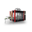 Industrial automated packaging machine with red frame and black enclosure featuring control panel and conveyor system