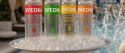 The transparent can is designed to showcase the product's composition, which includes vodka, purified water and fruit flavoring, while reinforcing visual clarity as a key packaging feature.