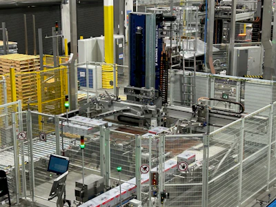 Closed cases pass through a checkweigher and ink-jet coder before making their way to this palletizer.