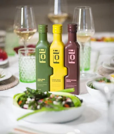 The Oil, Dressing & Vinegar Set uses matching bottle formats for olive oil, dressing and balsamic vinegar, replacing the mixture of different bottle shapes and visual styles typically found across these condiment categories.