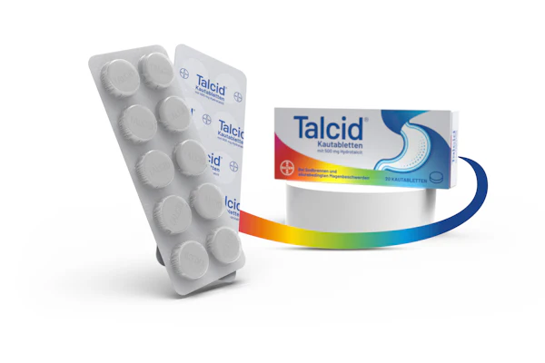 Talcid antacid medication blister pack and product box with rainbow gradient design