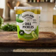 Cleveland Kitchen's classic dill pickle spears now ship in a 24-oz tub molded from 25% PureCycle recycled polypropylene by IPL Schoeller.