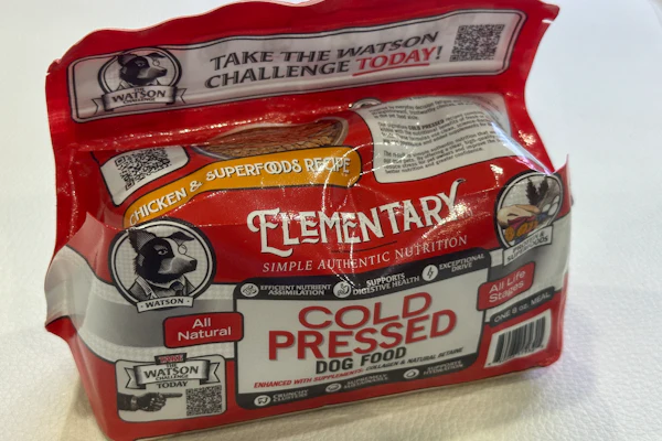 The Pouch3 Cuboid format on Elementary's Cold Pressed dog food is a box-like shape with no wasted headspace, using up to 30% less material than a flat-bottom or stand-up pouch of equivalent volume.