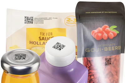 Product packaging featuring QR codes on sauce jar, white container, and goji berry pouch with yellow and purple labels