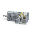 Industrial automated packaging machine with yellow robotic arms and safety enclosure