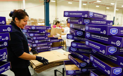 A Sterling CPI worker prepares trays for product loading. The contract packager's approach to streamlining healthcare packaging is being featured on 'All Access' with Andy Garcia, a public television series.