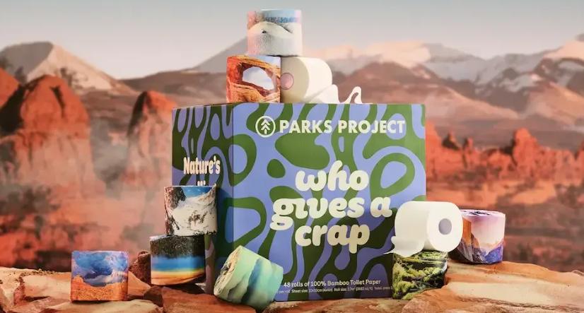 The packaging consists of 12 individual wrapper designs, each using landscape photography depicting different national parks across the United States.