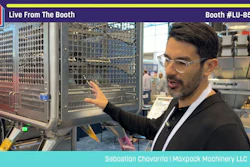 Man presenting industrial packaging machinery at Pack Expo booth LU-8547