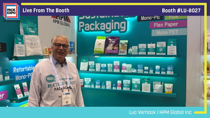 Man in glasses at sustainable packaging booth displaying eco-friendly mono-PE and flex paper products at Pack Expo trade show booth LU-8027
