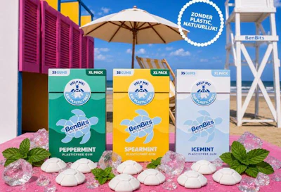 Three BenBits XL pack gum flavors displayed on pink sand with beach umbrella and lifeguard tower backdrop