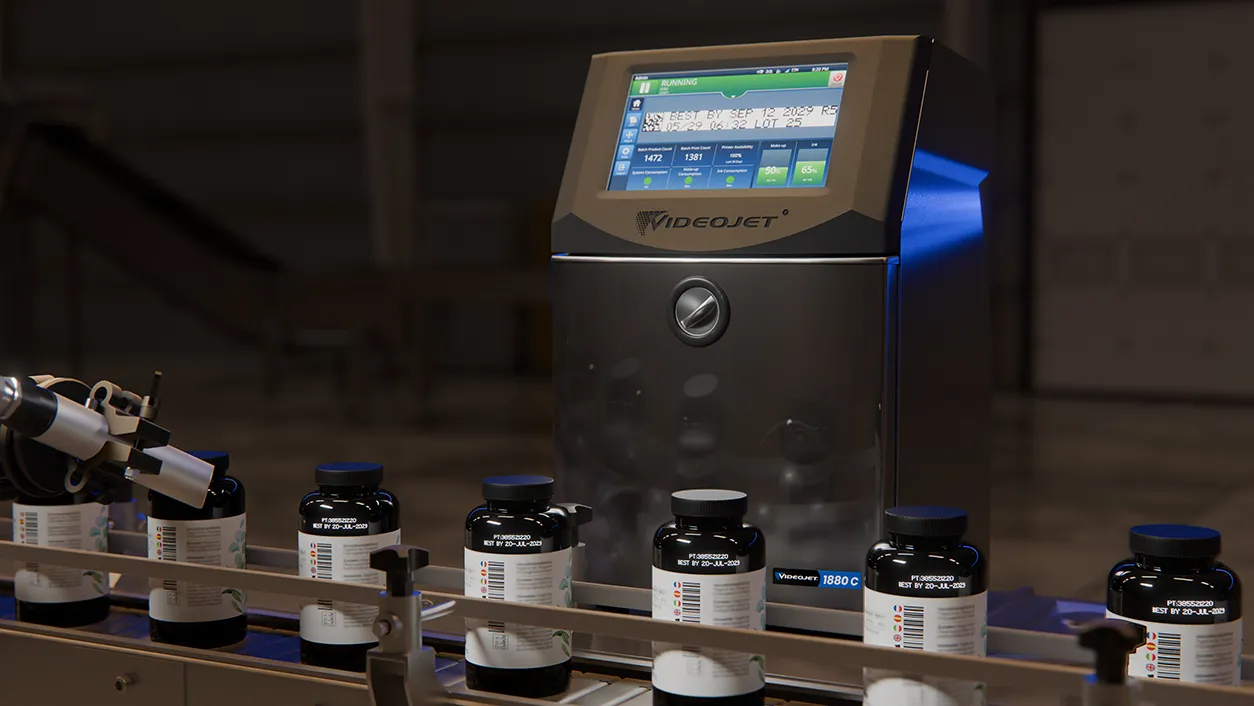 VideoJet industrial inkjet printer with multiple black ink bottles arranged on a production line