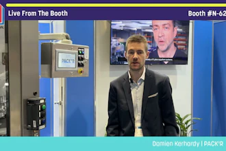 Professional man in business attire presenting at PACK'R booth during live trade show broadcast from Booth N-6240