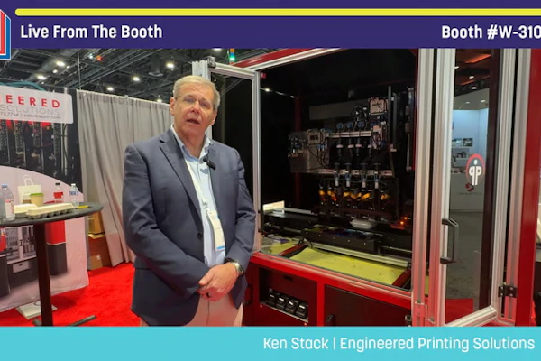 Ken Staack from Engineered Printing Solutions presents live at Pack Expo booth W-31050, standing before industrial printing equipment.