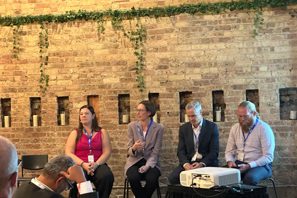 From left, Rebecca Lipscomb, VP, global regulatory affairs, INX International; (speaking) Laura Shimmin, associate director, global packaging R&D, Mars; Stefan Laske, head of R&D, consumer flexibles, Mondi; and Lowell Huffman, director of channel partnerships, rePurpose Global
