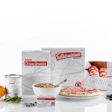 Assorted bakery and food products including packaged goods, fresh ingredients, and branded items arranged on white background
