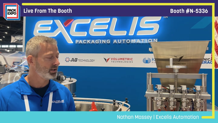 Nathan Massey from Excelis Automation demonstrates packaging automation equipment at Pack Expo booth N-5336