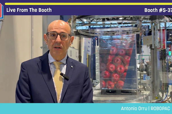 Antonio Orru from ROBOPAC presents live from booth S-3706 at PACK EXPO trade show with packaging equipment visible behind him