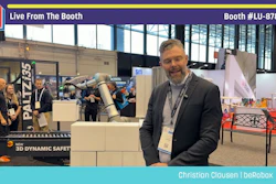 Christian Clausen from beRobox poses at Pack Expo booth LU-87818 featuring Palletizer robotic equipment