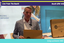 Man presenting cardboard packaging boxes at Pack Expo International booth W-44020 live demonstration