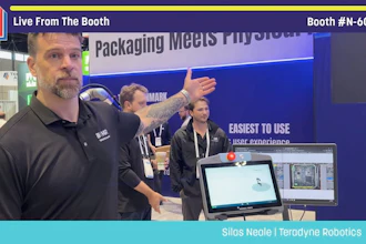 Presenter demonstrates Teradyne Robotics packaging solution at Pack Expo booth N-6041 with computer displays showing software interface