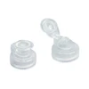 Two clear plastic flip-top dispensing caps with ribbed bases and hinged lids