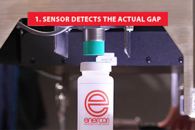 3D printer sensor detecting nozzle gap above Enercoa product bottle during calibration