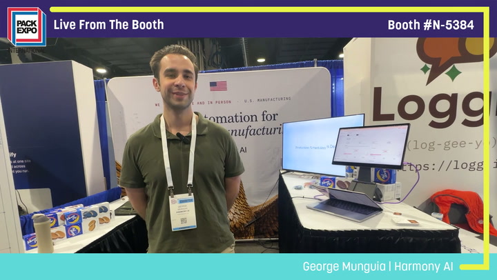 Man in green shirt at Pack Expo booth N-5384 presenting Harmony AI technology with laptop displays